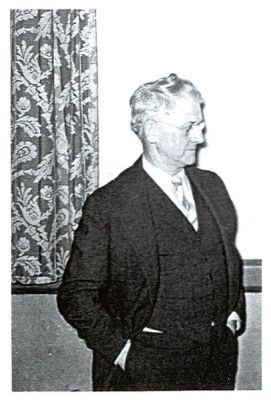 Profile of John Lloyd in his mid-years.